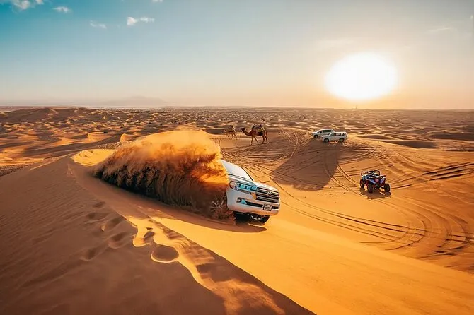 Evening Desert Safari Dubai with dune bashing, sunset and desert camp